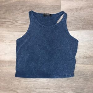 Girls blue tank top with rainbow stripes on side